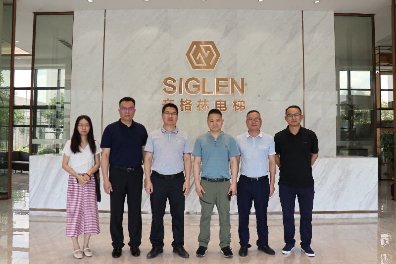 熱烈歡迎信宜市副市長率團(tuán)隊(duì)蒞臨辛格林電梯考察指導(dǎo)！